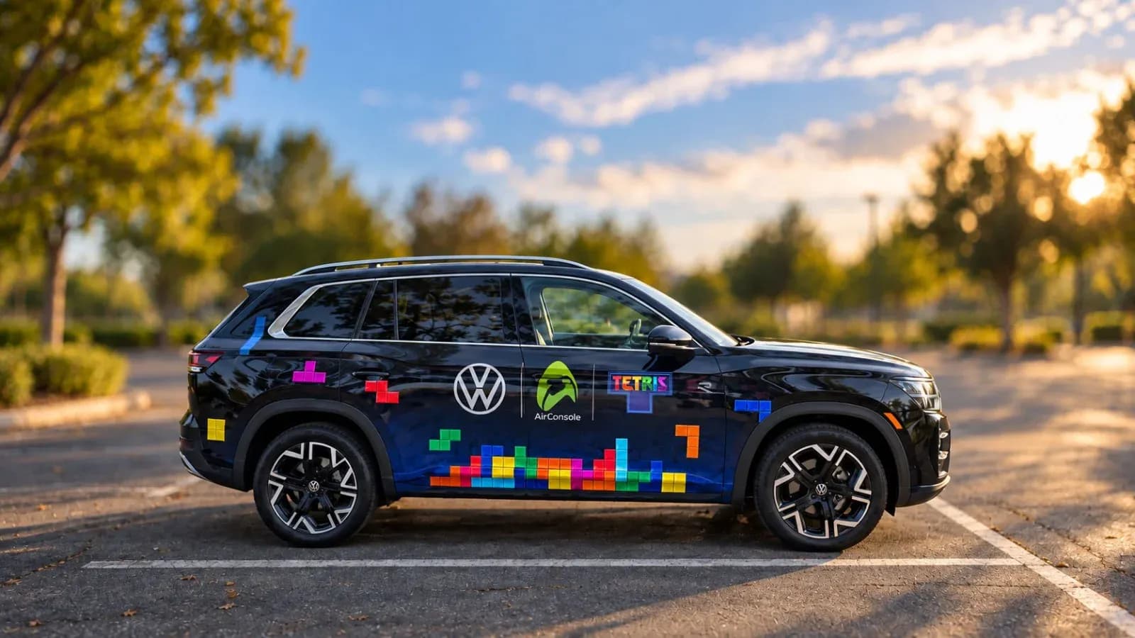 The 2027 Volkswagen Atlas in Tetris livery with Volkswagen, AirConsole and Tetris logos on the doors